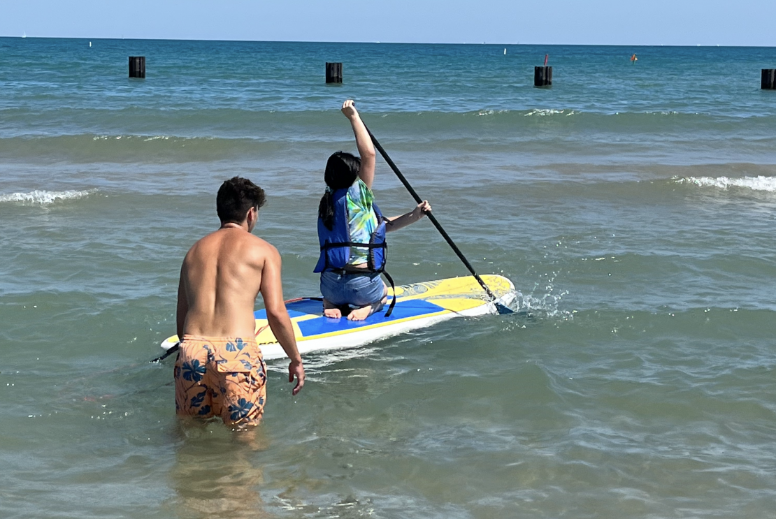 Paddleboarder and instructor